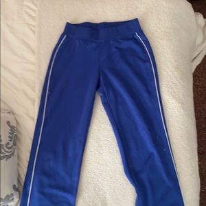 blue sweatpants with white stripes